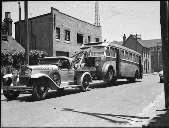 File:1929 Cadillac tow truck with bus Sydney.jpg
