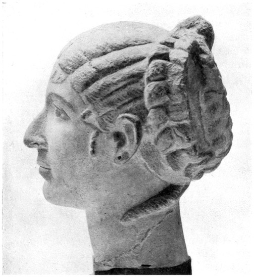 Profile bust of ancient queen (archival B&W photograph)