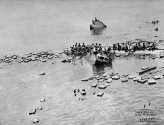 Survivors from the Netherlands merchant ship 'sJacob about to be rescued by HMAS Bendigo (out of picture). The ship had been sunk by Japanese aircraft on their way to attack Oro Bay, New Guinea.