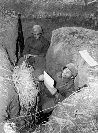 L-R: Pvt. Edgar Vasques Rodriges, and Pvt. Maria Feliciano Gauza, both from Rio De Janeiro. 11 December, 1944. Photographer: Thompson.