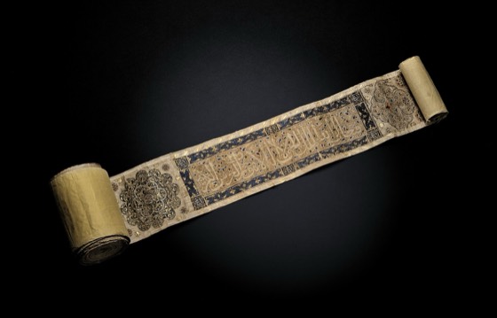 A QUR'AN SCROLL (TUMAR) COMMISSIONED FOR GHIYATH AL-DIN SULTAN MUHAMMAD IBN SULTAN ERETNA, SIGNED MUBARAKSHAH IBN 'ABDULLAH, EASTERN ANATOLIA, DATED AH 754/1353-54 AD Arabic manuscript on buff paper, the beginning with a series of alternated round and rectangular panels heavily and elegantly illumin