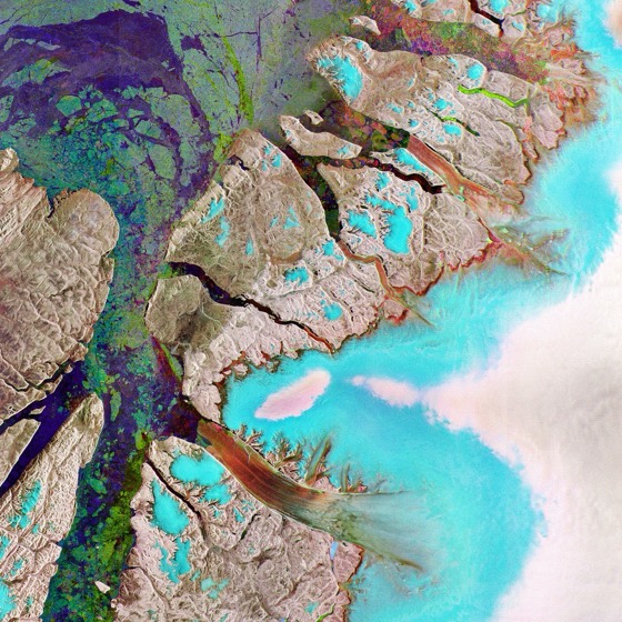 Envisat radar image featuring the northeastern tip of Ellesmere Island (left) in the Canadian Arctic and northwestern Greenland (right) – the world’s largest island. The water (indicated by purple and green colours) pictured in the lower part of the image is Nares Strait. The northernmost part of Na